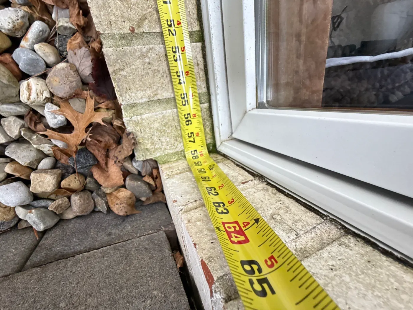 Storm-damaged window documented in Hope